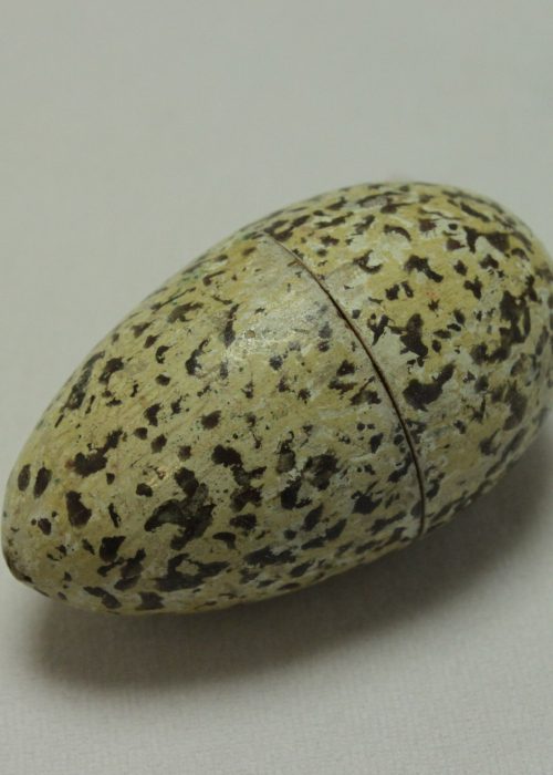 Egg shaped wooden thimble holder Egg shaped wooden thimble holder