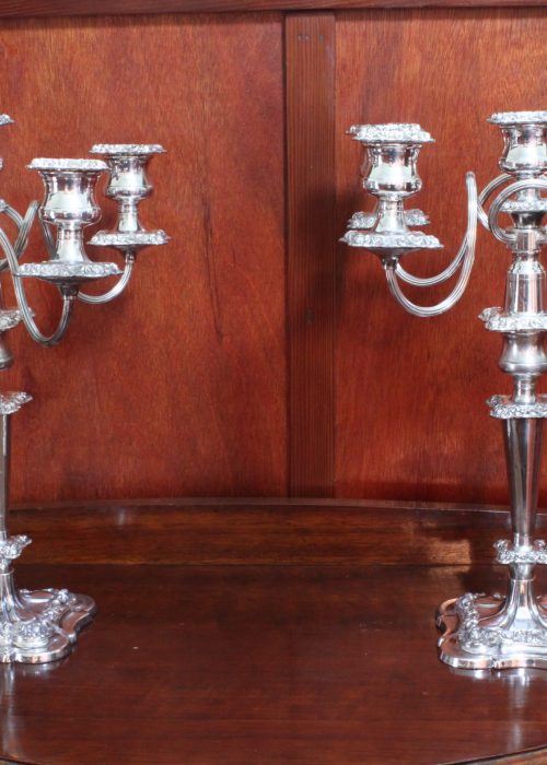 Pair of silver plated four branch candelabra Pair of silver plated four branch candelabra