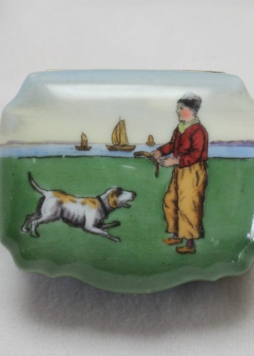 Hand coloured porcelain pill box with Dutch scene Hand coloured porcelain pill box with Dutch scene