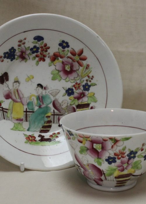 Hand coloured bone china cup and saucer c 1820. Hand coloured bone china cup and saucer c 1820.