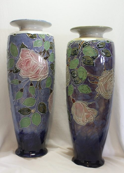 Pair of Royal Doulton tubelined stoneware vases