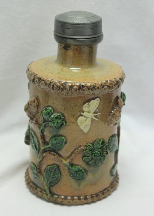 Pewter lidded pottery tea canister