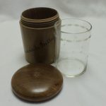 Turned walnut glass case