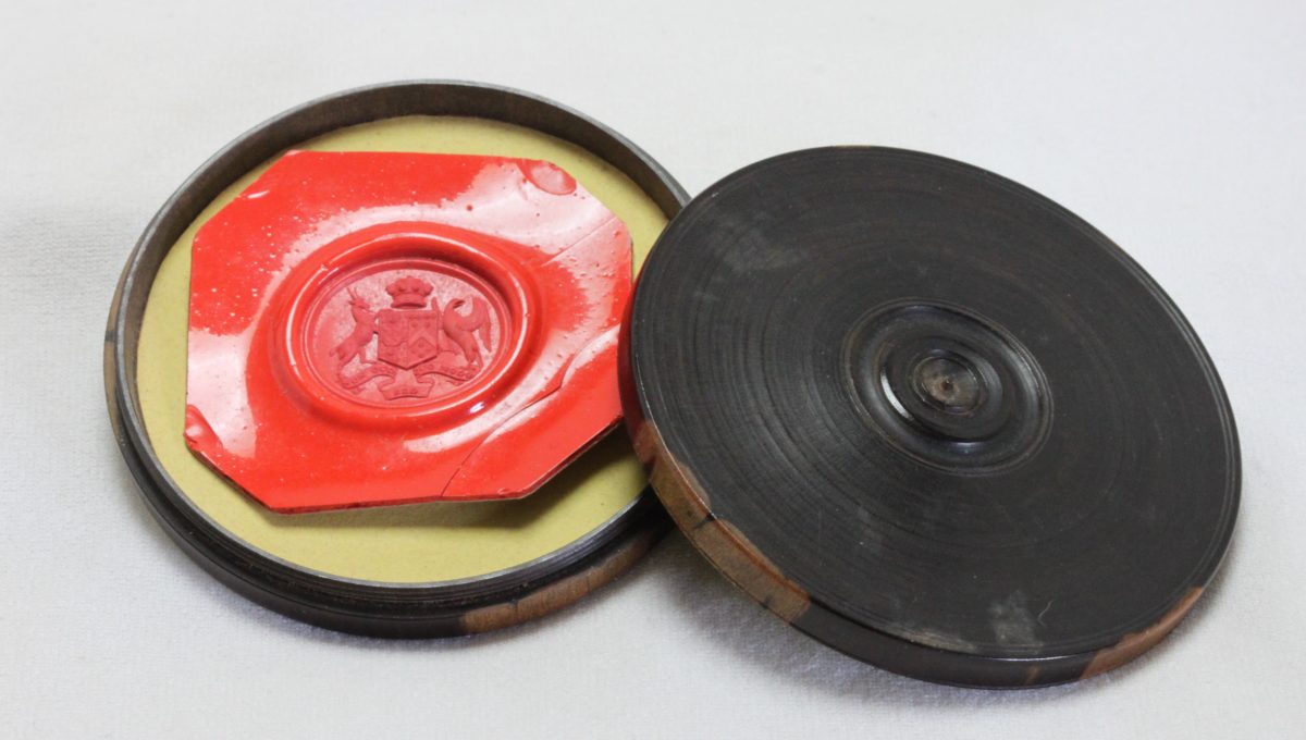 Wax seal impression in a turned ebony box 63 mm diameter China Rose