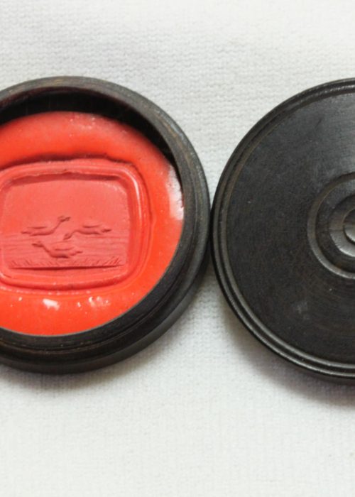 Wax seal impression in a turned ebony box 29 mm diameter