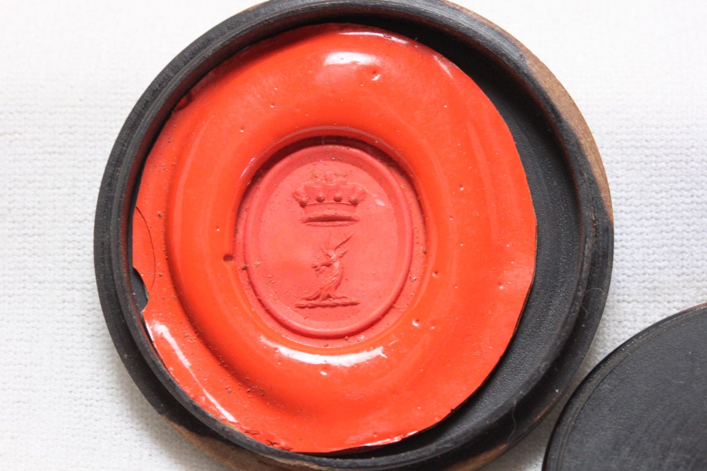 Wax seal impression in a turned lignum vitae box 41 mm diameter China Rose Antiques