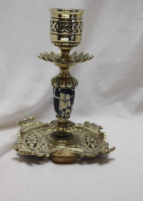 Brass candlestick with blue and white insert