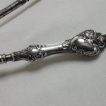 Silver handled button hook and shoe horn Birmingham 1909.