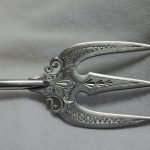 Engraved sterling silver bread fork with Ivorine handle