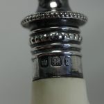 Engraved sterling silver bread fork with Ivorine handle